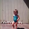 Girl in Blue Bathing Suit